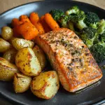 Garlic Butter Salmon with Roasted Potatoes, Glazed Carrots & Steamed Broccoli