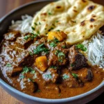 Slow-Cooked Beef Curry with Garlic Naan